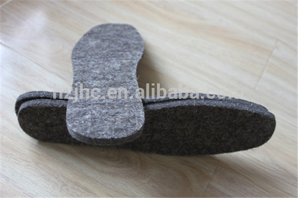 Thick polyester hard needle punched non woven insoling lining fabric