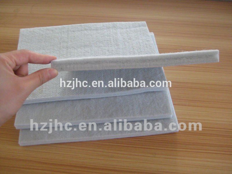 Anti-slip nonwoven felt with resin dots for mattress underlay